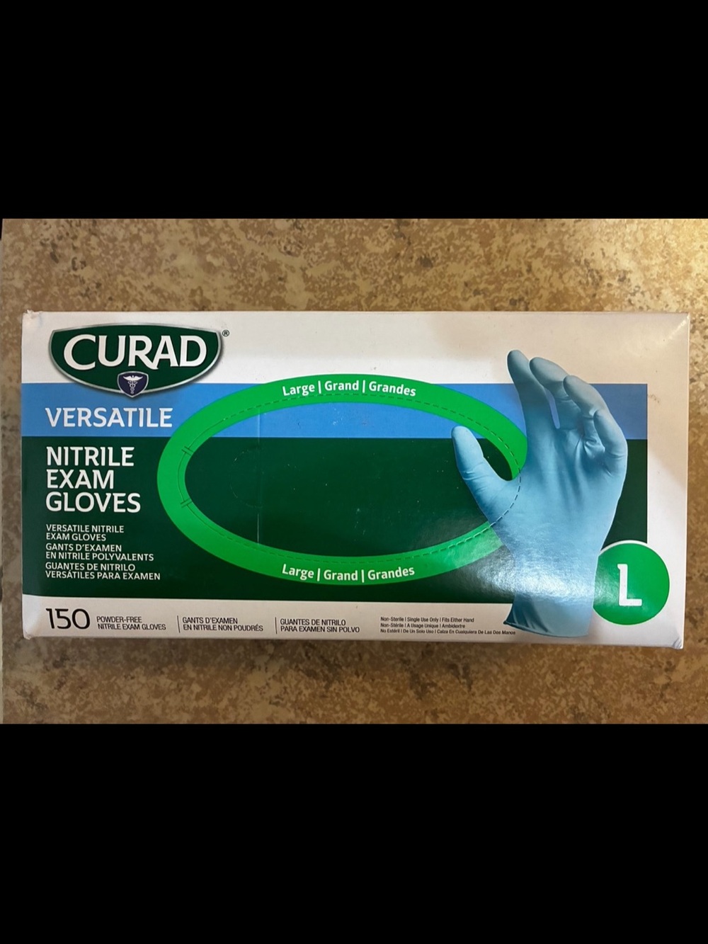 New! Box of Curad Powder-Free Textured Nitrile Gloves with 150 gloves. (Large)
